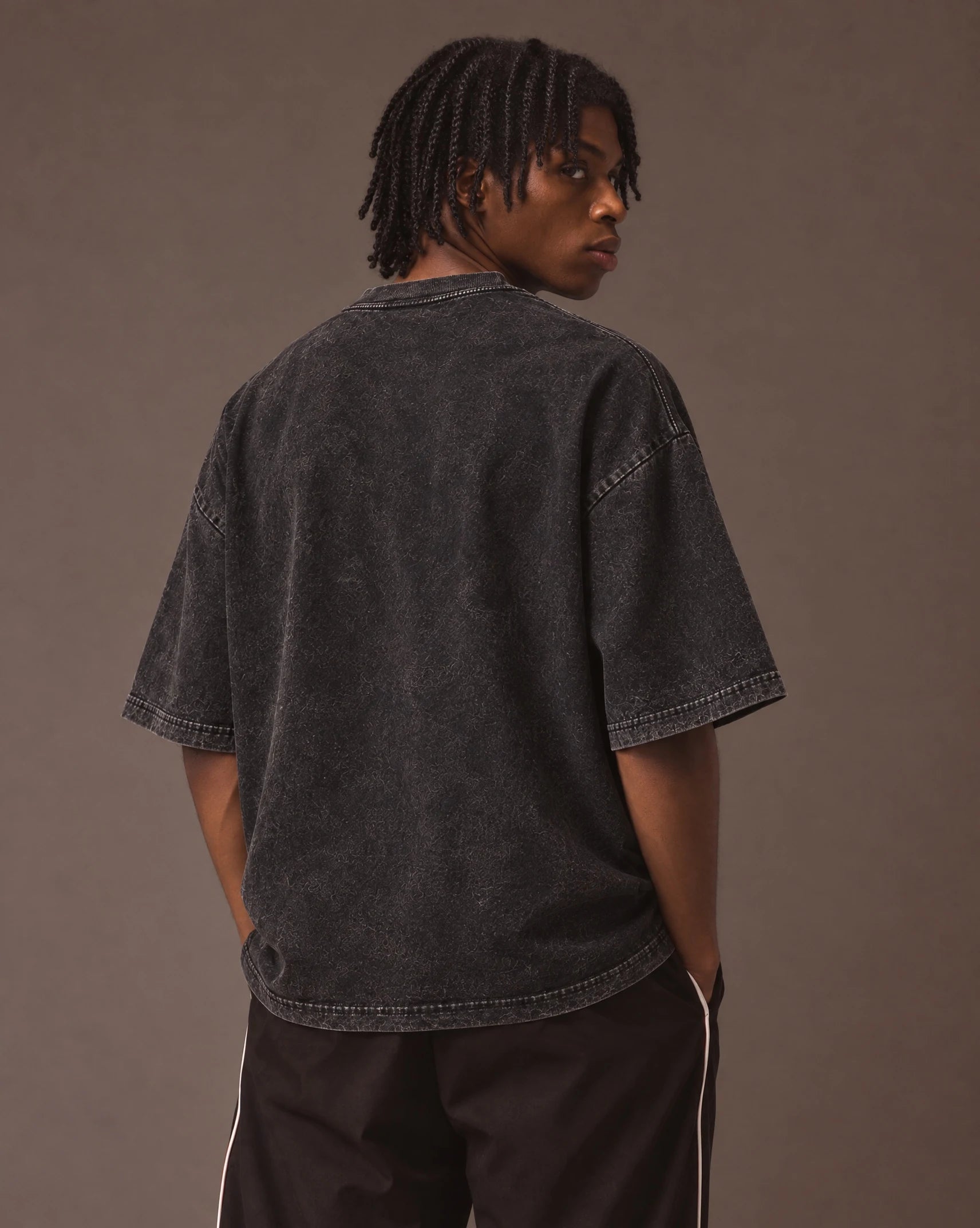 Model wearing the LeBron James — Crowned King Tee, back view
