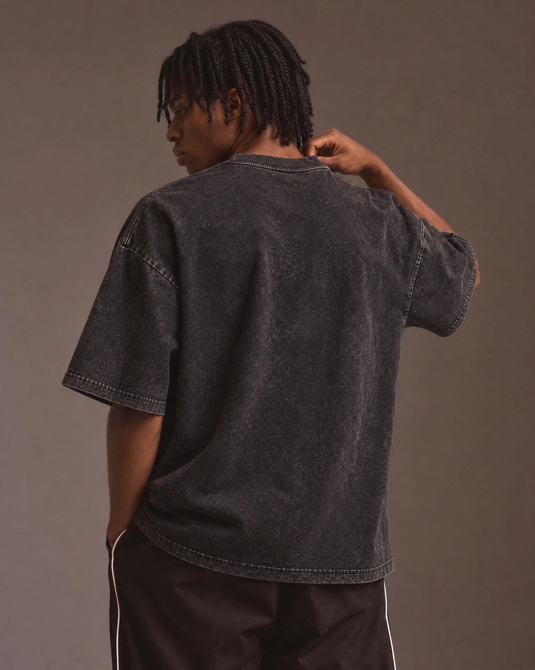 Model wearing the LeBron James — King Signature Tee, back view
