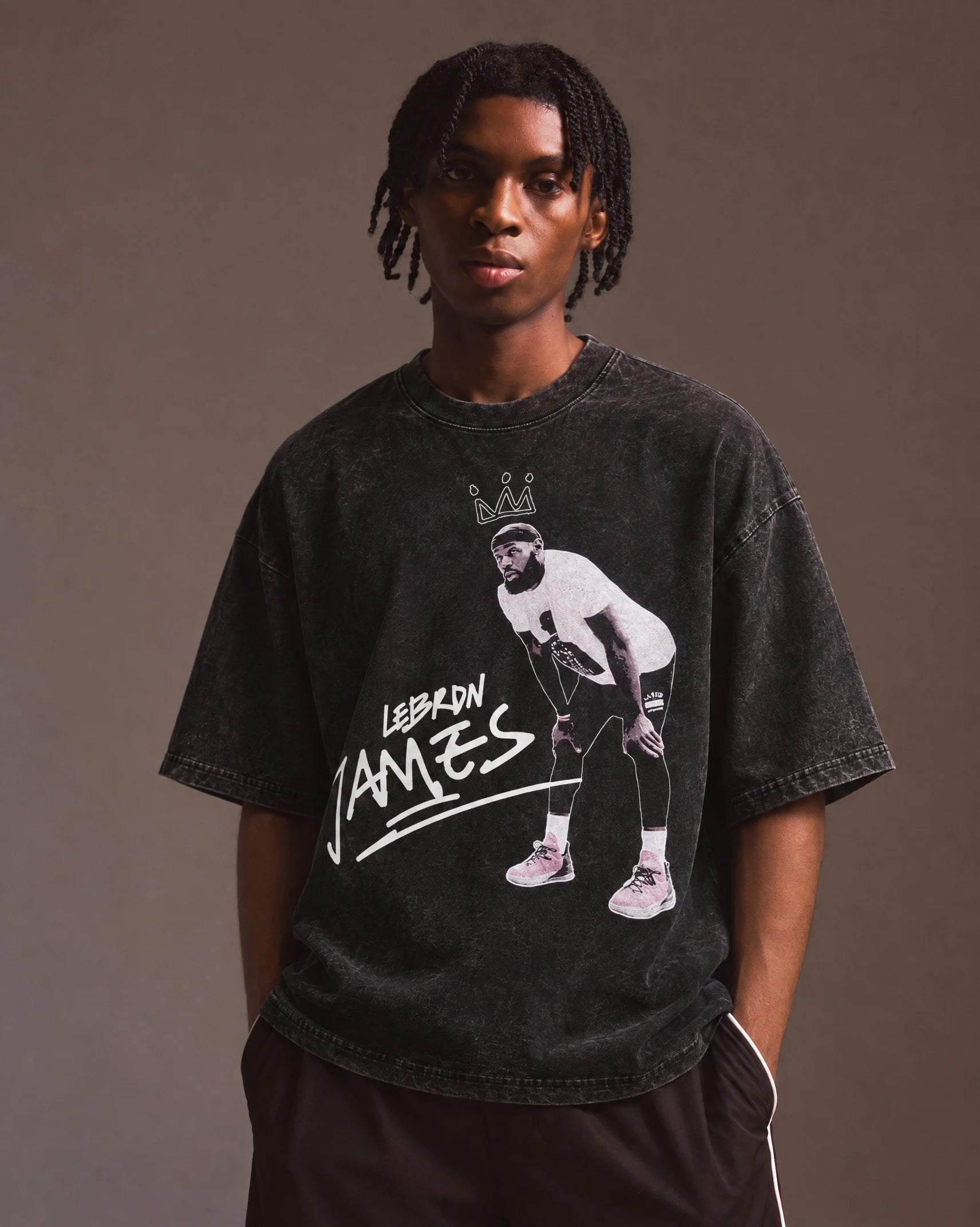 Model wearing the LeBron James — King Signature Tee, front view